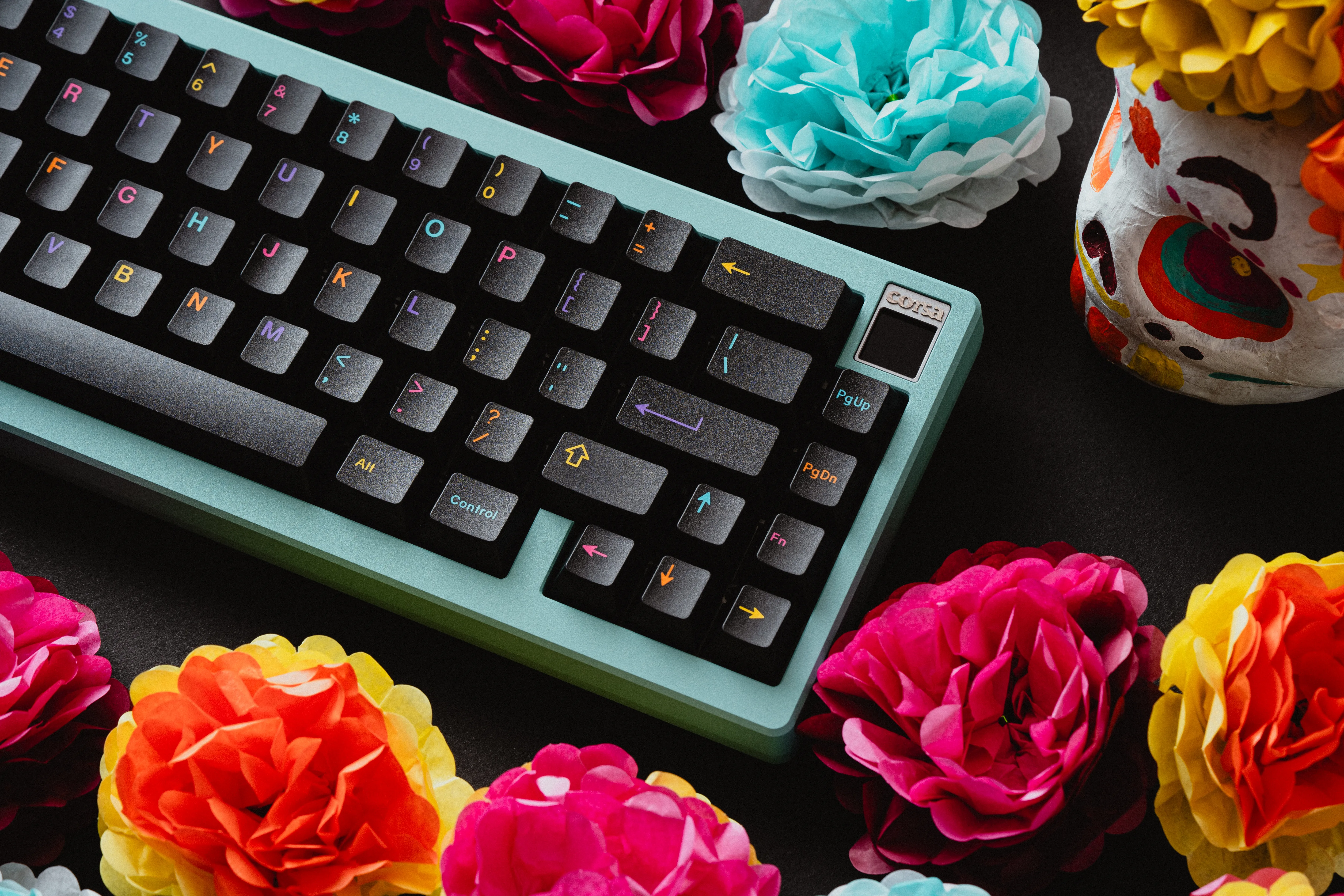 GMK Mictlán keycaps with colorful legends on teal keyboard
